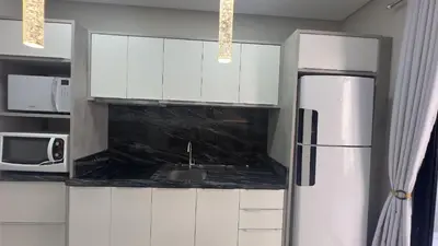 A cozinha ou kitchenette de 570 - Lindo Flat á 350m da praia de Bombas