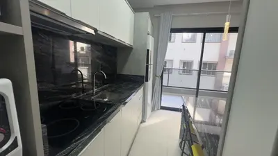 A cozinha ou kitchenette de 570 - Lindo Flat á 350m da praia de Bombas