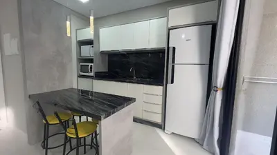 A cozinha ou kitchenette de 570 - Lindo Flat á 350m da praia de Bombas