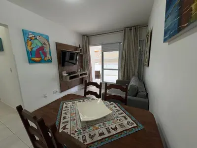 Uma televisão e/ou sistema de entretenimento em cód 144 - Apartamento aconchegante!