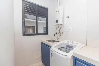 A cozinha ou kitchenette de 107A - Apartamento a poucos metros do mar em Bombas