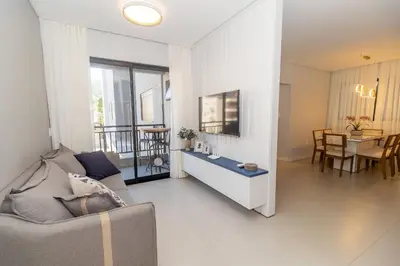 Uma área de estar em 107A - Apartamento a poucos metros do mar em Bombas