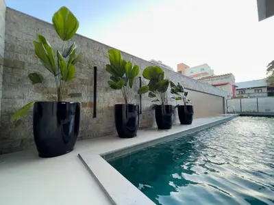 A piscina em ou perto de 115F - 3 quartos a 100m da Praia de Bombas