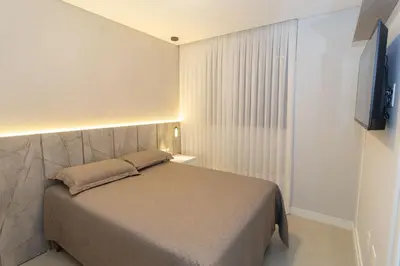 Uma cama ou camas num quarto em 182J - 3 quartos a 100m da Praia de Bombas