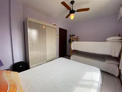 Uma cama ou camas num quarto em 324 - Apartamento confortável na praia de Bombas