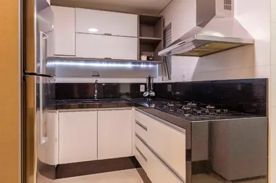 A cozinha ou kitchenette de Condomínio com Piscina e Spa - Boulevard Bombinhas