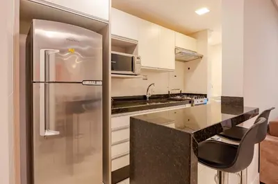 A cozinha ou kitchenette de Localização Privilegiada Apartamento a 200m da Praia