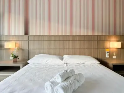 Uma cama ou camas num quarto em Amplo apartamento em Palmas - GCR002