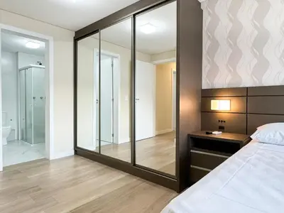 Uma cama ou camas num quarto em Amplo apartamento em Palmas - GCR002
