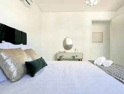 Uma cama ou camas num quarto em Brisa de Palmas - Res. Maria Eduarda - GCR003