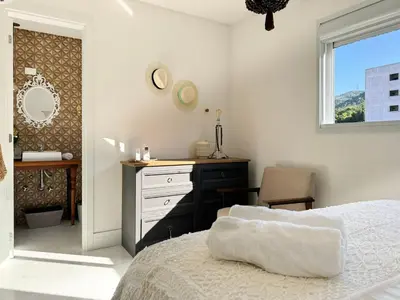 Uma cama ou camas num quarto em Brisa de Palmas - Res. Maria Eduarda - GCR003