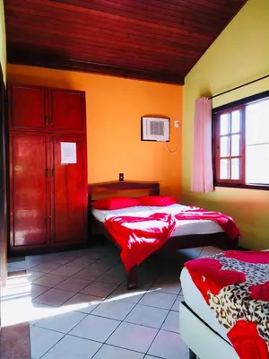 Uma cama ou camas num quarto em Residencial Portal do Sol
