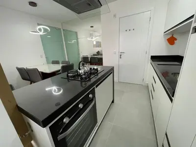 A cozinha ou kitchenette de Cód 98 - Belissímo apartamento á 280m do mar