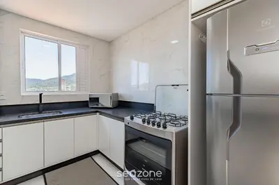 A cozinha ou kitchenette de CII - Apartamentos a 900m da Praia em Porto Belo
