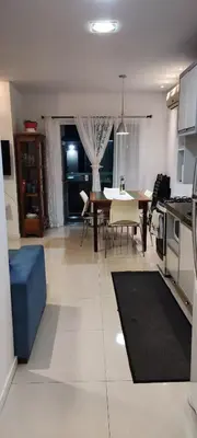 A cozinha ou kitchenette de AP completo na Praia de Palmas, SC