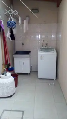 A cozinha ou kitchenette de Lindo sobrado em Itapema