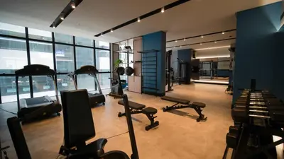 O centro de fitness e/ou as comodidades de fitness de Flat no Coração de Meia Praia em Itapema