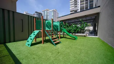 A área de jogos para crianças em Flat no Coração de Meia Praia em Itapema