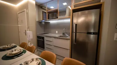 A cozinha ou kitchenette de Flat no Coração de Meia Praia em Itapema