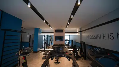 O centro de fitness e/ou as comodidades de fitness de Flat no Coração de Meia Praia em Itapema