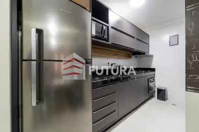 A cozinha ou kitchenette de Apartamento para aluguel de temporada Bombas,SC