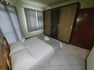 Uma cama ou camas num quarto em Casa Master com Piscina em Gov Celso Ramos
