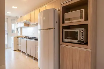 A cozinha ou kitchenette de Condomínio com Piscina e Jacuzzi - Boulevard
