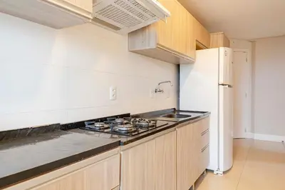 A cozinha ou kitchenette de Condomínio com Piscina e Jacuzzi - Boulevard