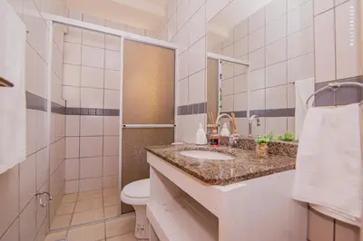 Uma casa de banho em Quattro Isole Residencial