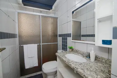 Uma casa de banho em Quattro Isole Residencial
