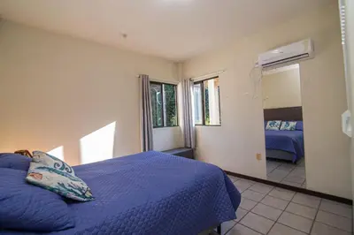Uma cama ou camas num quarto em Quattro Isole Residencial