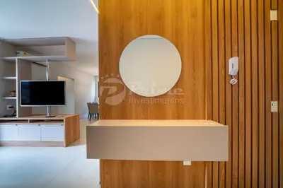 Uma televisão e/ou sistema de entretenimento em Lindo Apartamento em Bombas - Areias de Bombas
