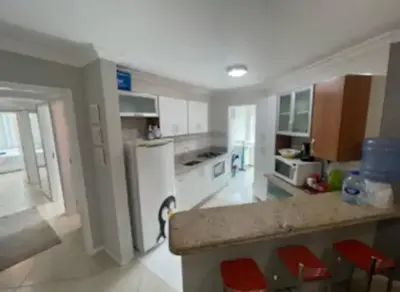 A cozinha ou kitchenette de Ap pé na areia itapema frente mar