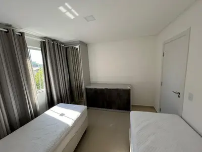 Uma cama ou camas num quarto em 082 - Apto confortável na praia de Bombas