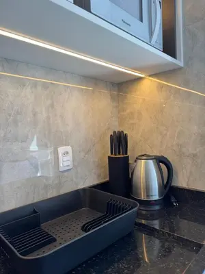 A cozinha ou kitchenette de Novíssimo e confortável apartamento em Palmas