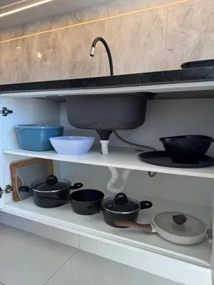 A cozinha ou kitchenette de Novíssimo e confortável apartamento em Palmas