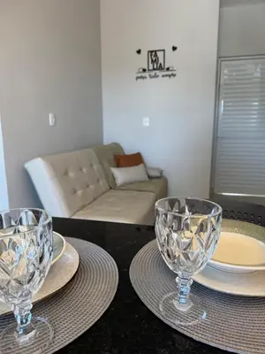 Uma área de estar em Novíssimo e confortável apartamento em Palmas