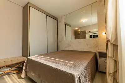 Uma cama ou camas num quarto em Sunset Residence