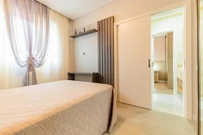 Uma cama ou camas num quarto em Sunset Residence