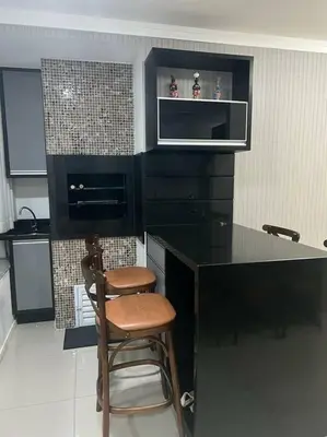 A cozinha ou kitchenette de Apartamento Porto Belo - Perequê