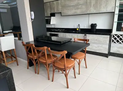A cozinha ou kitchenette de Apartamento Porto Belo - Perequê