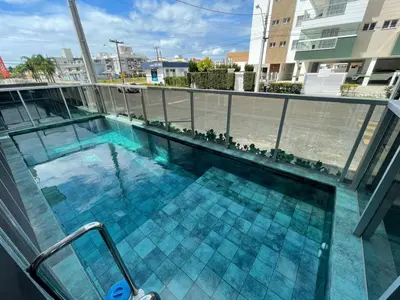A piscina em ou perto de Cód 66 - Excelente apartamento á 350 do mar
