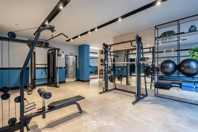 O centro de fitness e/ou as comodidades de fitness de IFT - Ed. Infinity Tower Flat 350m da Meia Praia