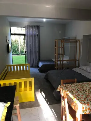 Uma cama ou camas num quarto em Saracura