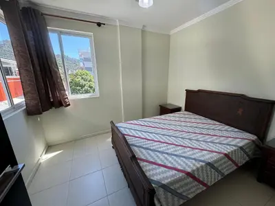 Uma cama ou camas num quarto em Cód 60 - Apartamento á 250 m do mar