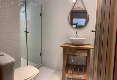 Uma casa de banho em Ape 1 - Jacuzzi e Vista parcial Mar - Bombinhas, SC