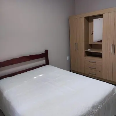 Uma cama ou camas num quarto em Maravilhosa casa na praia de Bombas