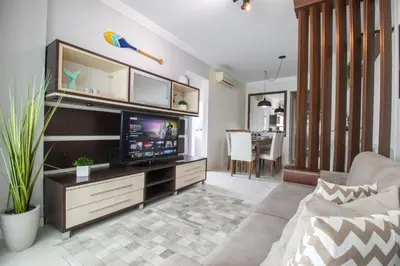 Uma televisão e/ou sistema de entretenimento em QUA41 - 3Dorm, Climatizado, Churrasqueira