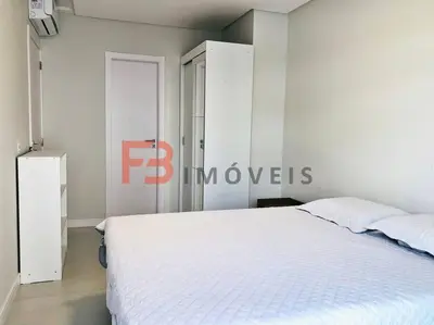Uma cama ou camas num quarto em Apartamento praia Bombas