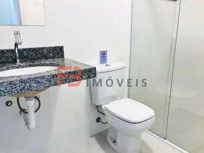 Uma casa de banho em Apartamento praia Bombas